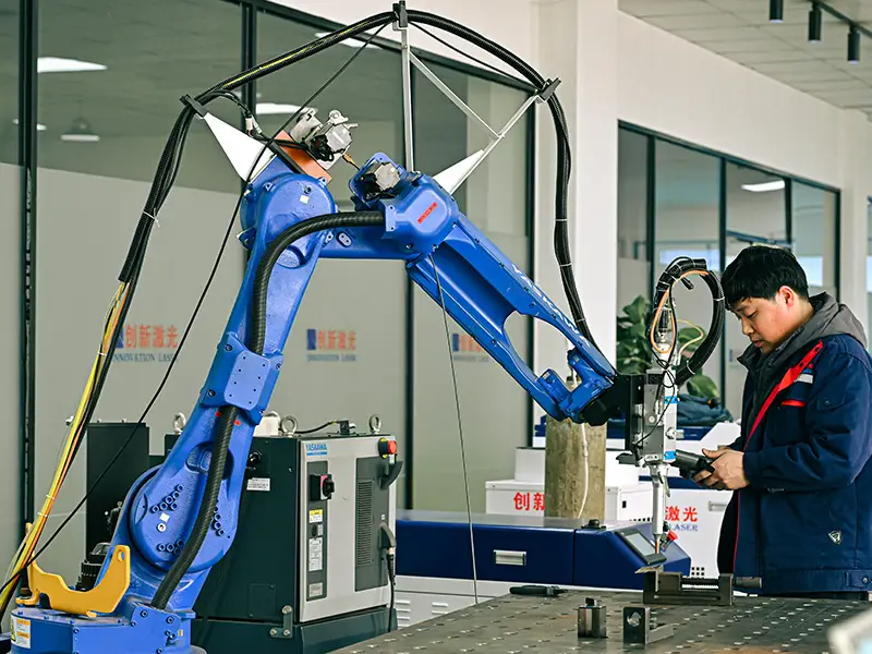 Laser cutting machines are used by workers